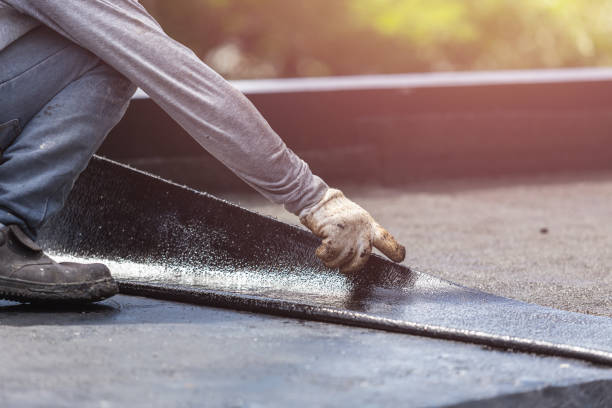 Professional Waterproofing technician working in Port Jefferson, NY